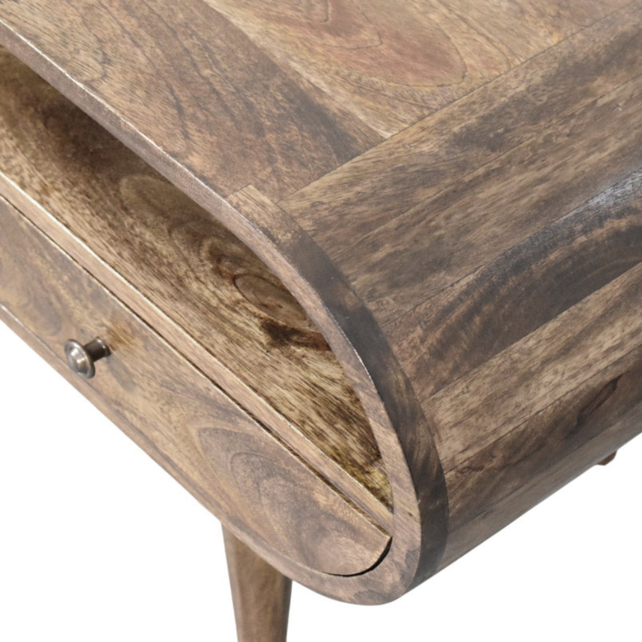 Close-up of a wooden media unit with a drawer.