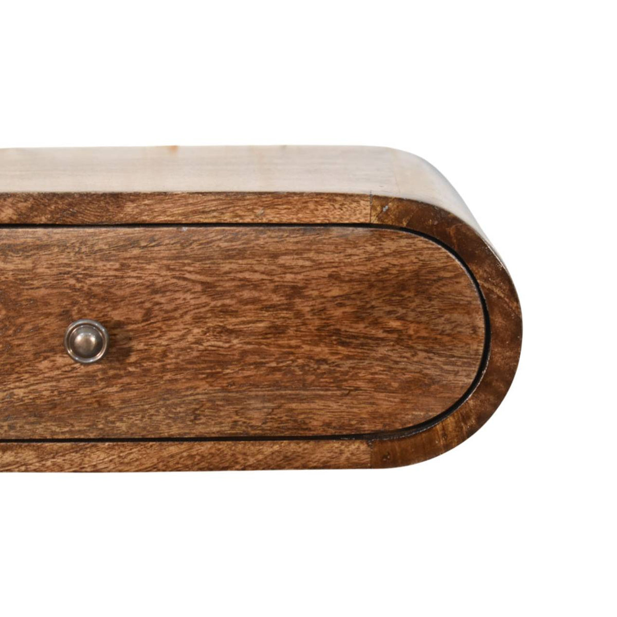 Close-up of a wooden drawer with a metal knob on a white background