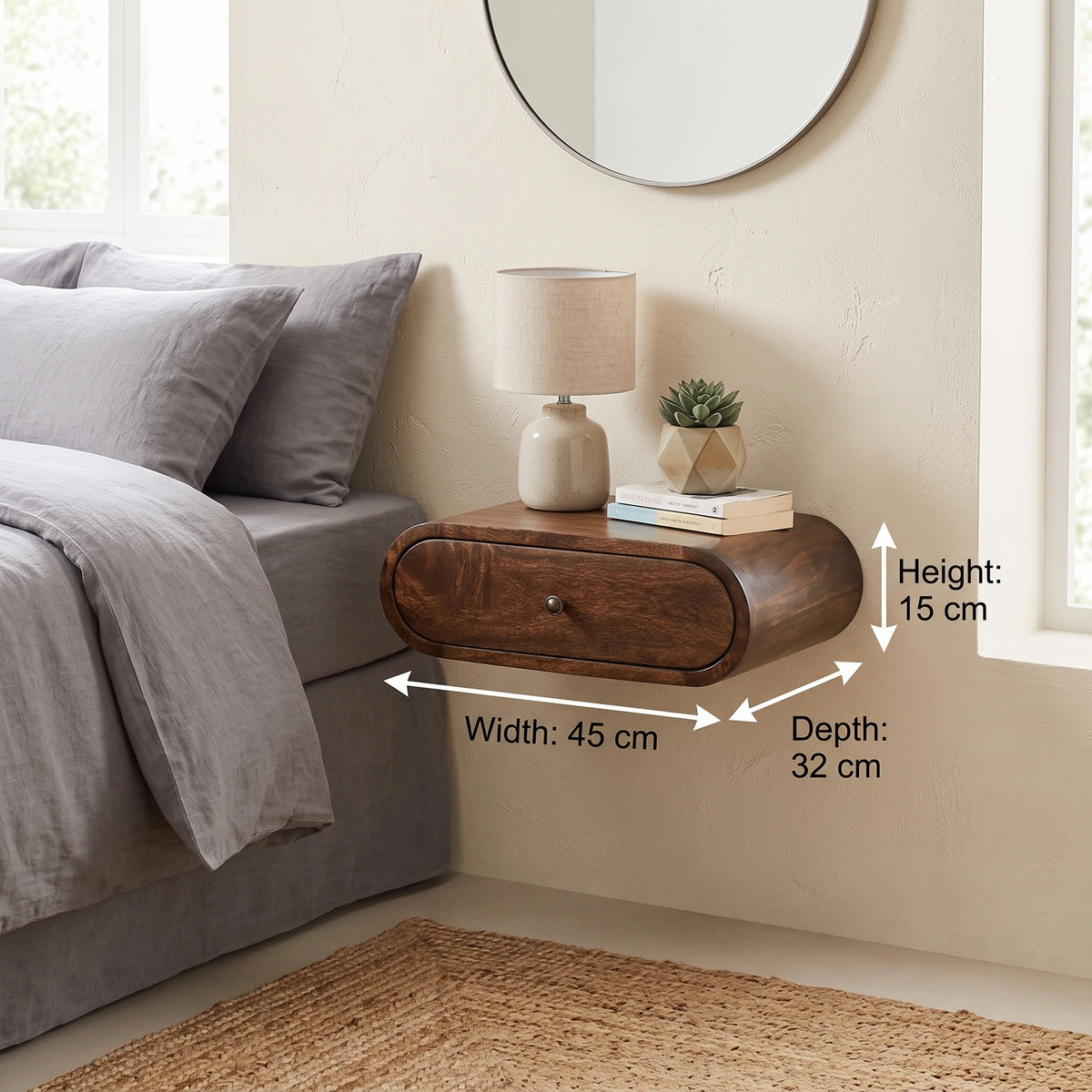 A floating wooden nightstand with a single drawer is shown mounted on a beige wall beside a bed. White dimension arrows label the product measurements as width 45 cm, depth 32 cm, and height 15 cm.