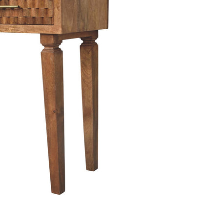Close-up of a wooden console table with a white background