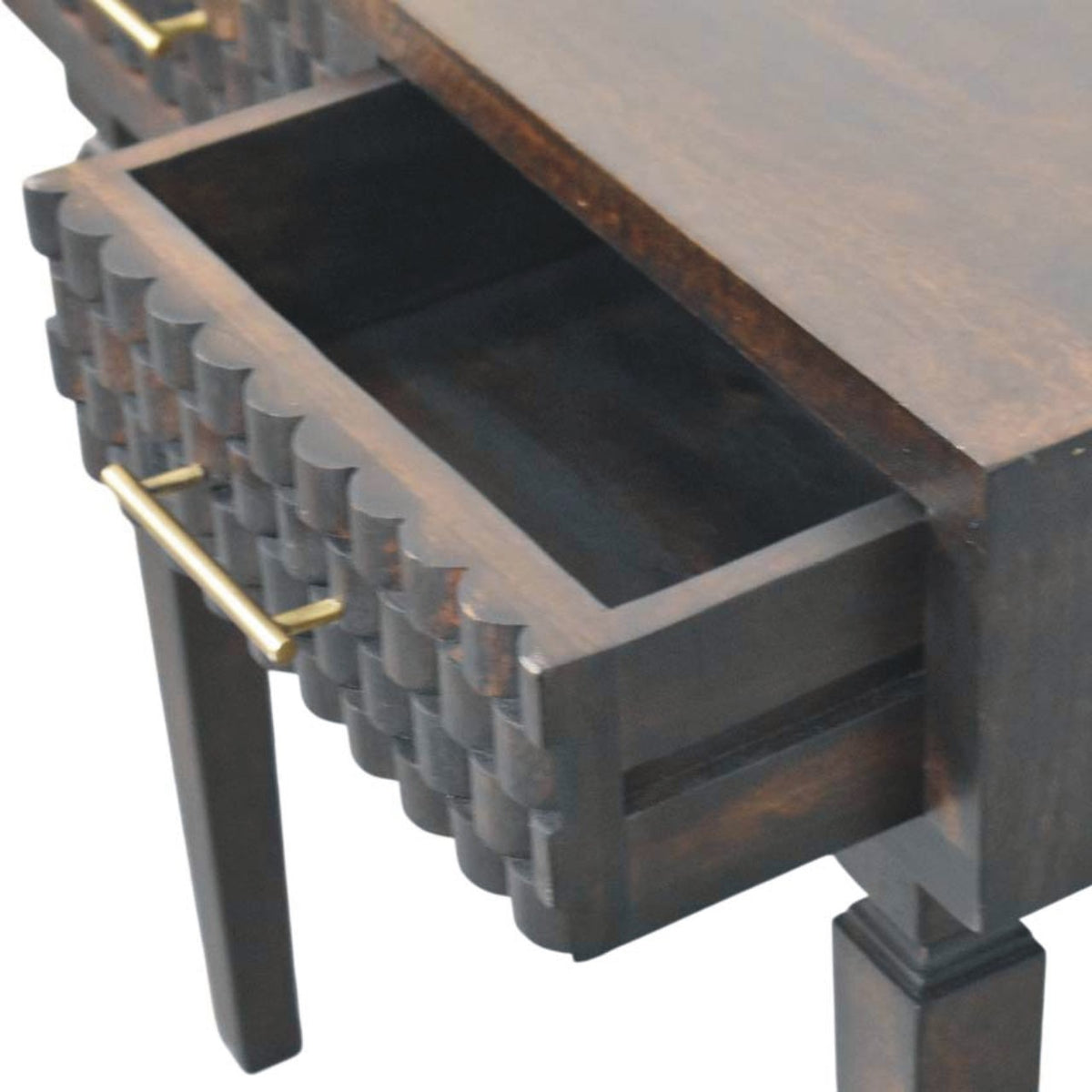 Dark wooden console table with textured surface, a drawer open and gold handle on a white background