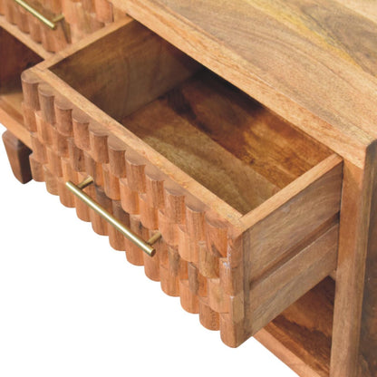 Wooden drawer of a shoe cabinet with gold handle on a white background
