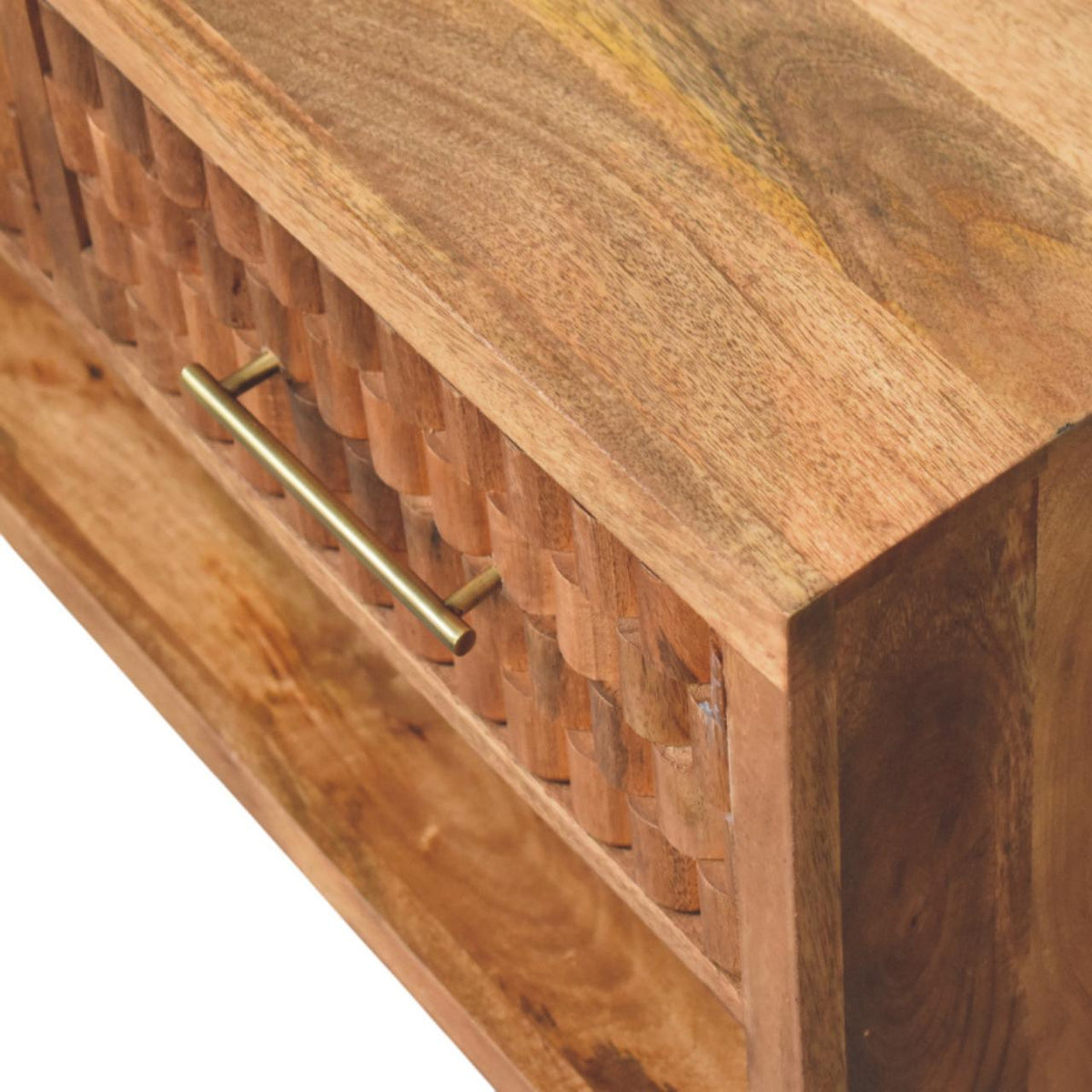 Close-up of a wooden drawer of a shoe cabinet with a gold handle on a white background