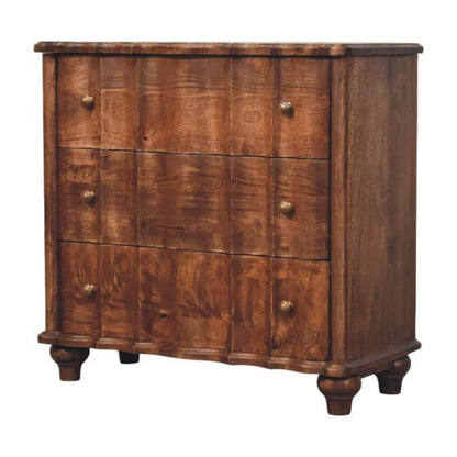 Angled right perspective of a three-drawer panelled solid mango wood chest in a rich roasted almond finish.
