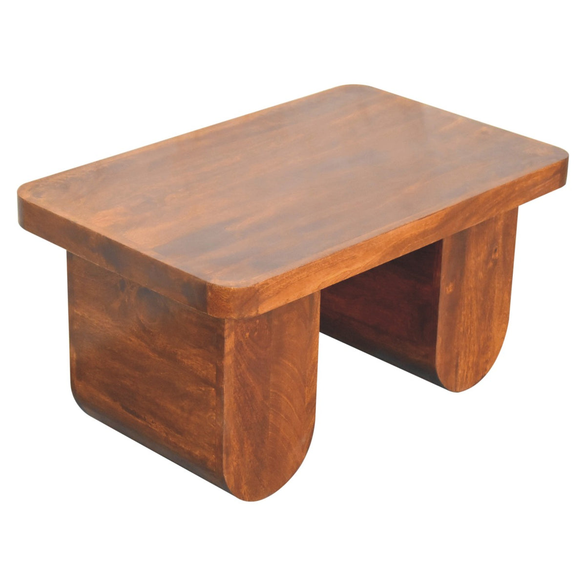 Detail shot looking down at the thick top edge and the rounded U-shape of the solid wood leg on a chestnut coffee table.