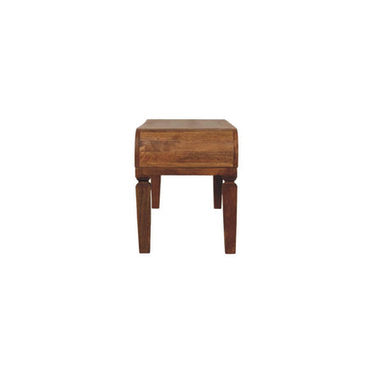 Straight-on side profile view of a solid mango wood coffee table with a warm amber oak finish.