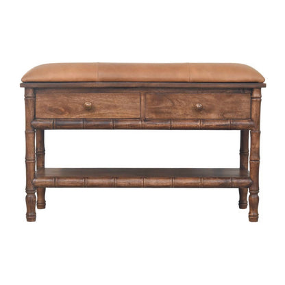 Wooden bench with a brown leather cushion on a white background