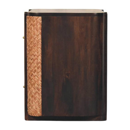 Straight-on side profile view of a velvet mocha bedside table, showcasing the continuous woven rattan texture covering the side panel between two solid wood posts.