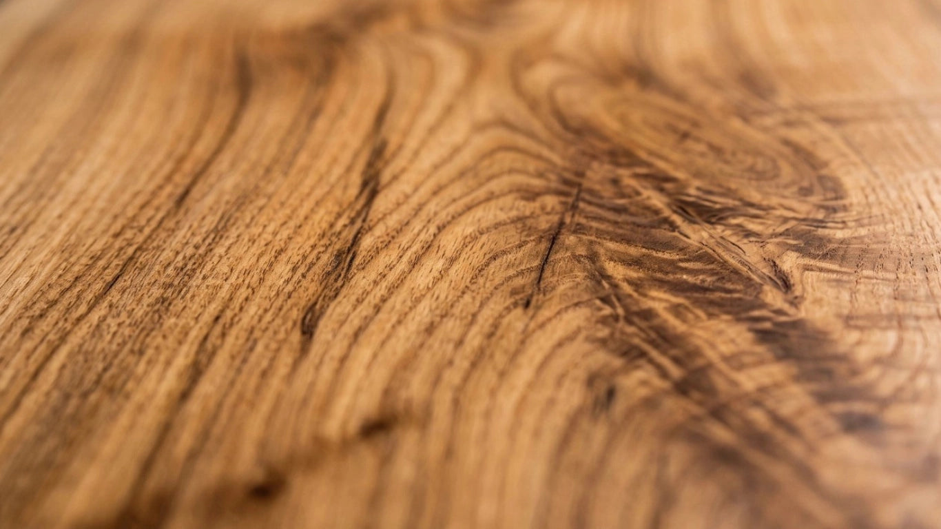 Close-up of chestnut wood grain texture – The Artisan Edit solid mango wood furniture