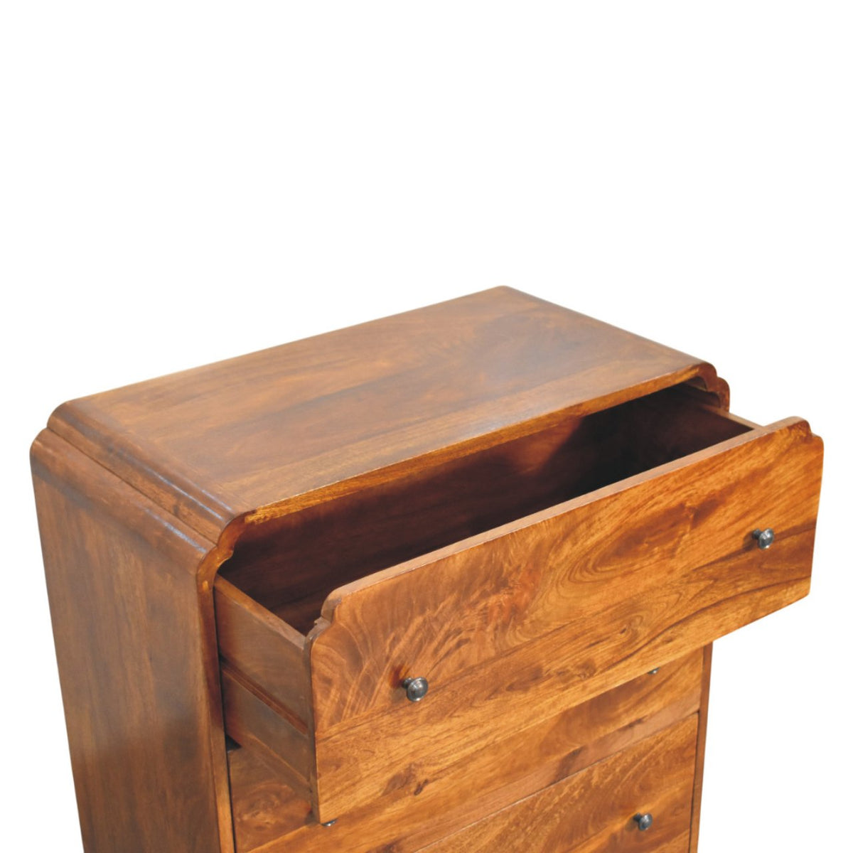 Close-up of a wooden drawer of a chest of drawers on a white backgroun