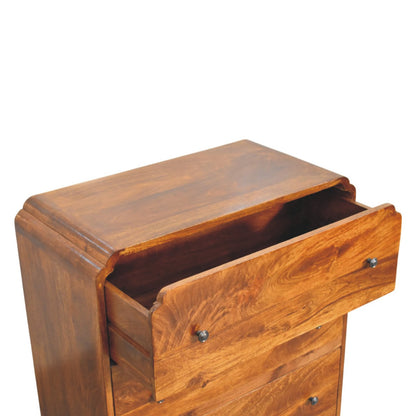 Close-up of a wooden drawer of a chest of drawers on a white backgroun