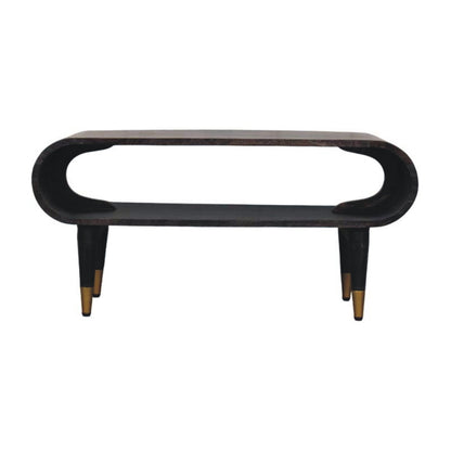 Modern black media unit with curved design on a white background