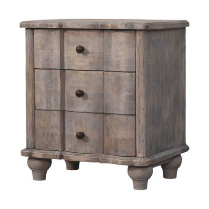 Wooden nightstand with three drawers on a white background