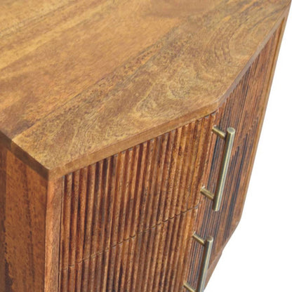 Wooden bedside table with a textured finish and brass handle on a white background