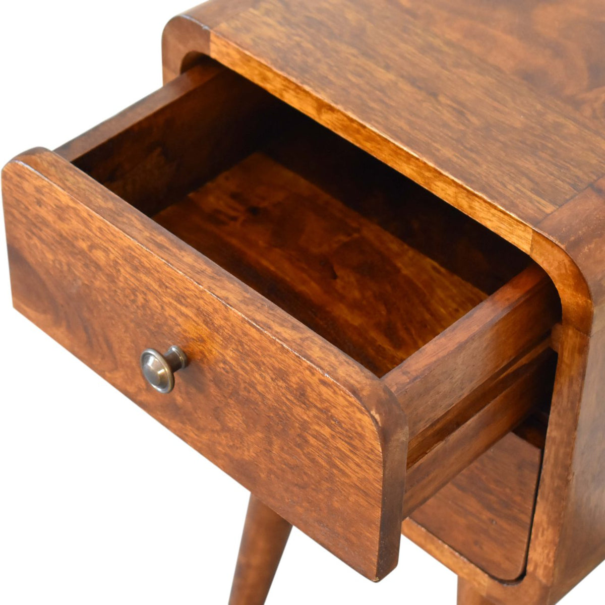 Wooden drawer unit of a nightstand with an open drawer on a white background