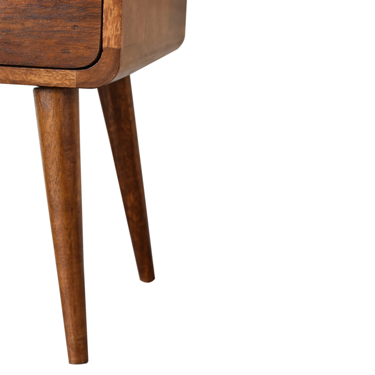Close-up of a wooden bedside table with a white background
