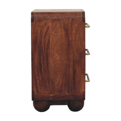 Wooden chest with three drawers on a white background