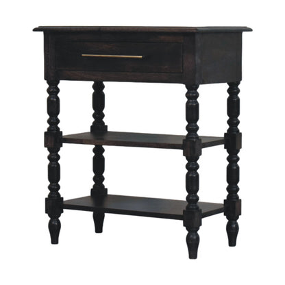 Angled left perspective of a carbon ash solid mango wood side table, highlighting its decorative turned legs and open shelving.