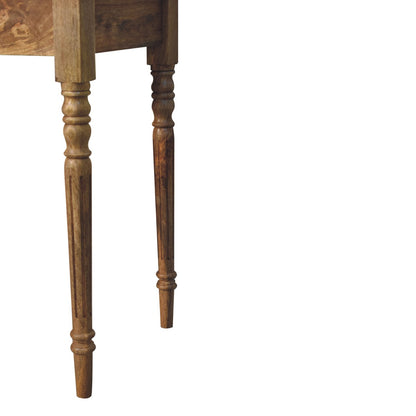 Turned-leg writing desk in solid mango wood, Oak finish – turned leg detail, lower right