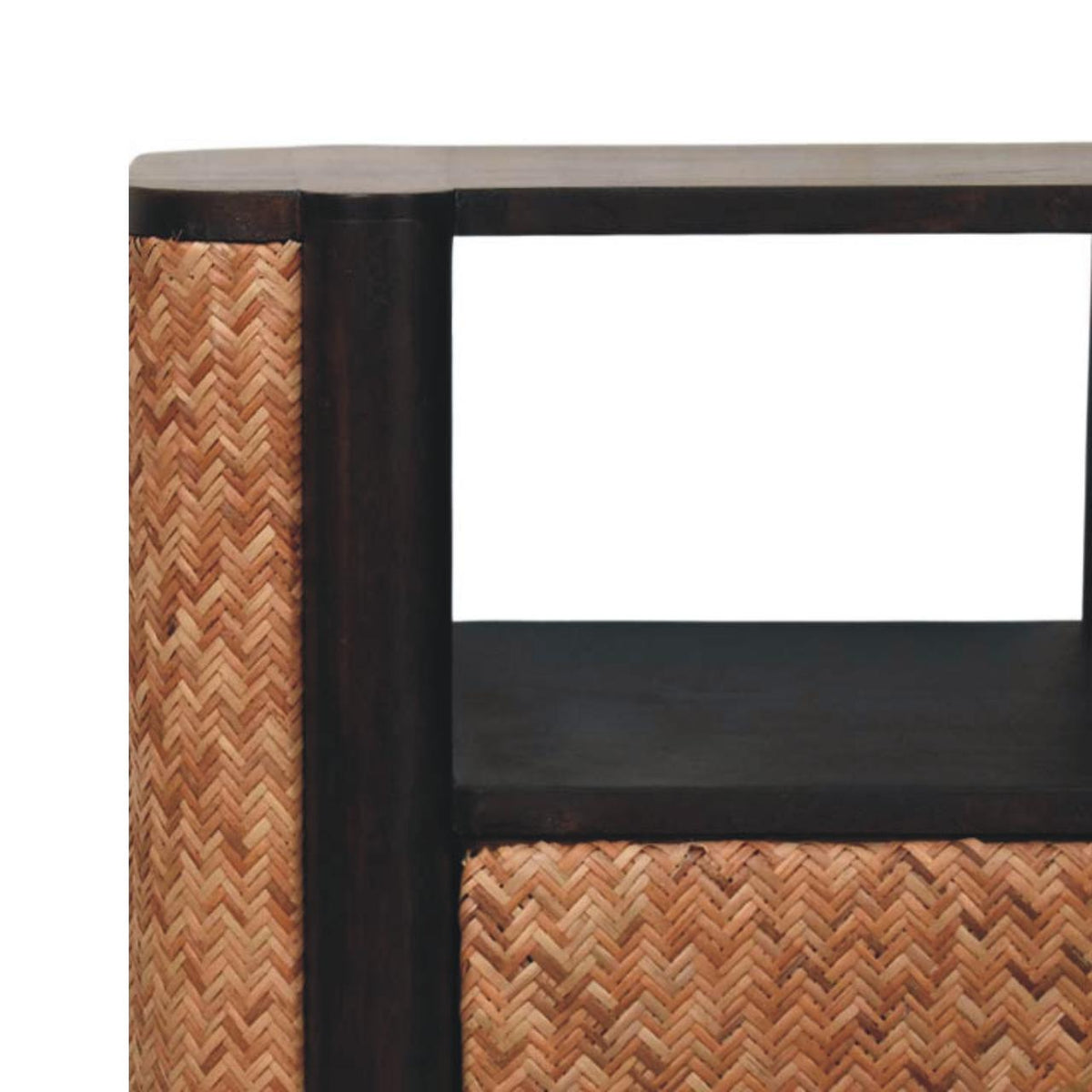 Close-up of the open shelf and rounded corner on a velvet mocha bedside table, highlighting the contrast between the dark wood and woven edge texture.