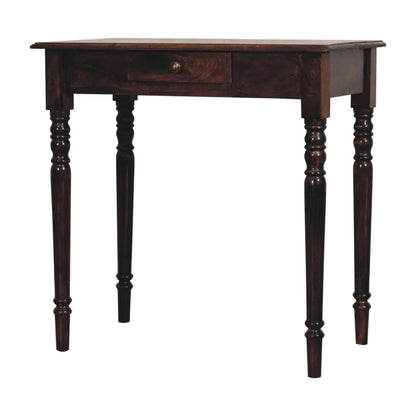 Dark writing desk with a single drawer on a white background