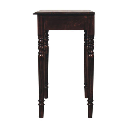 A dark brown wooden writing desk with a rectangular top, a single drawer, and four turned legs, shown against a plain white background.