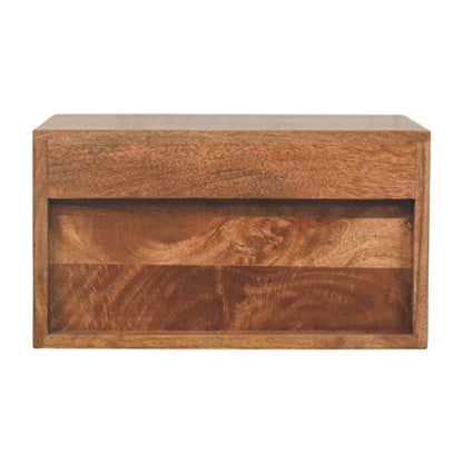 Back view of a golden teak floating bedside table, showing the recessed back panel and wooden cleat system for wall mounting.